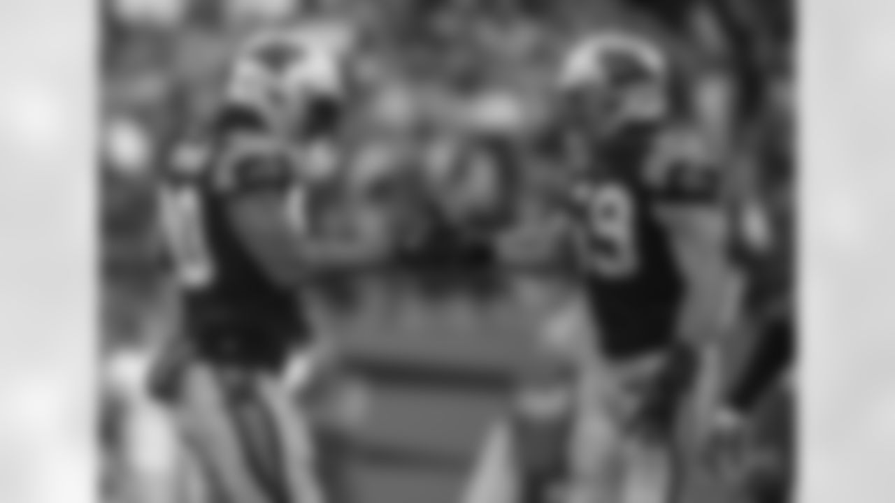 Luke Kuechly and Julius Peppers