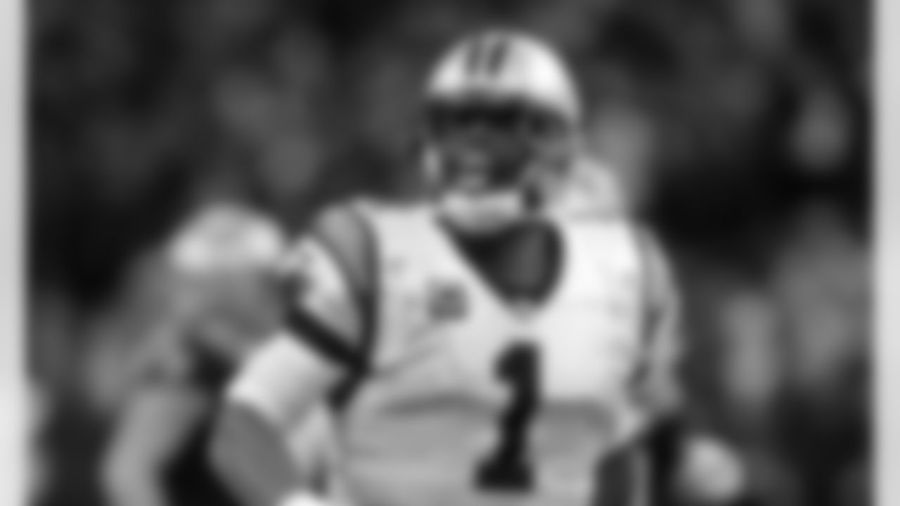 Carolina Panthers quarterback Cam Newton (1) reacts after throwing a touchdown pass in the second half of an NFL football game against the New Orleans Saints in New Orleans, Sunday, Jan. 7, 2018. (AP Photo/Butch Dill)