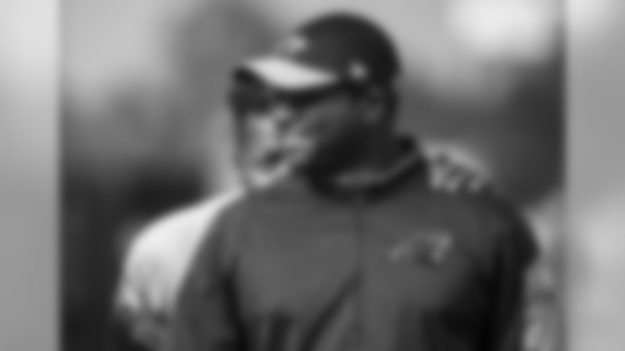 RB Jonathan Stewart and Asst. Defensive Line Coach Sam Mills, III