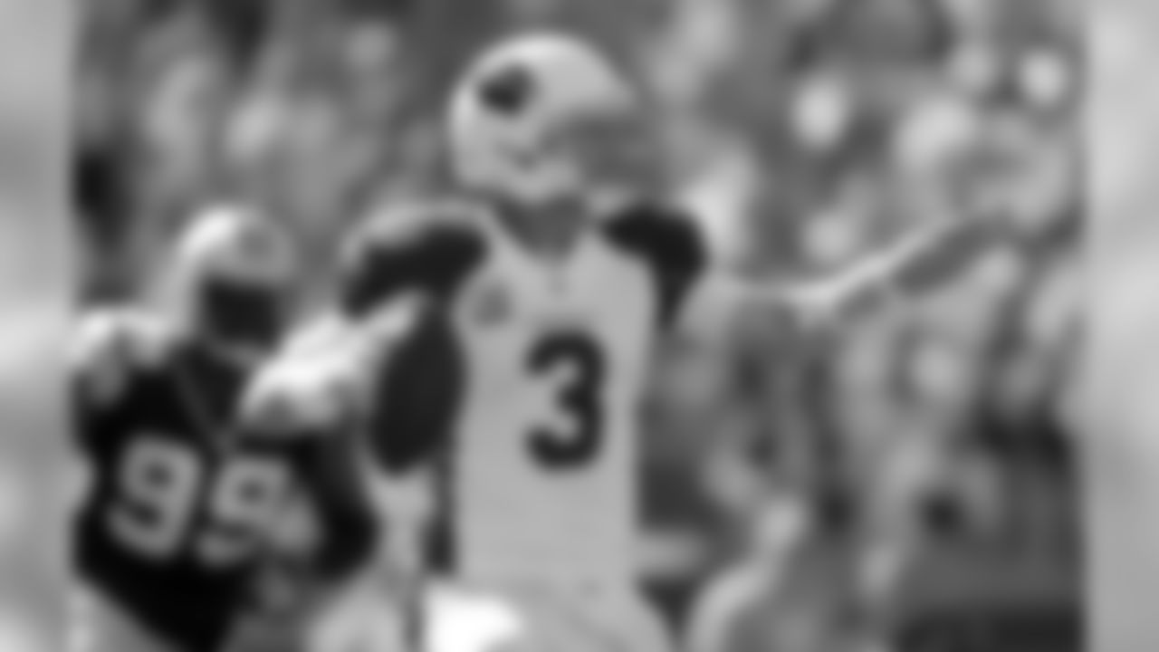 Arizona Cardinals' Carson Palmer (3) looks to pass against the Carolina Panthers in the first quarter of an NFL football game in Charlotte, N.C., Sunday, Oct. 30, 2016. (AP Photo/Bob Leverone)