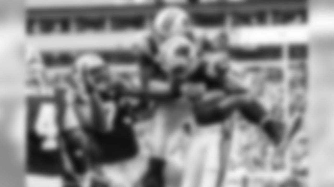 T Michael Oher, QB Cam Newton and WR Devin Funchess