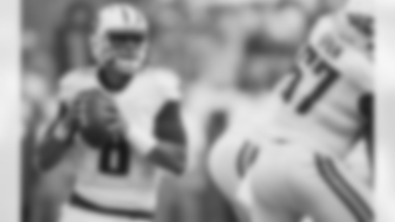 Tennessee Titans quarterback Marcus Mariota (8) works against the Carolina Panthers the first half of an NFL preseason football game, Saturday, Aug. 20, 2016, in Nashville, Tenn. (AP Photo/James Kenney)