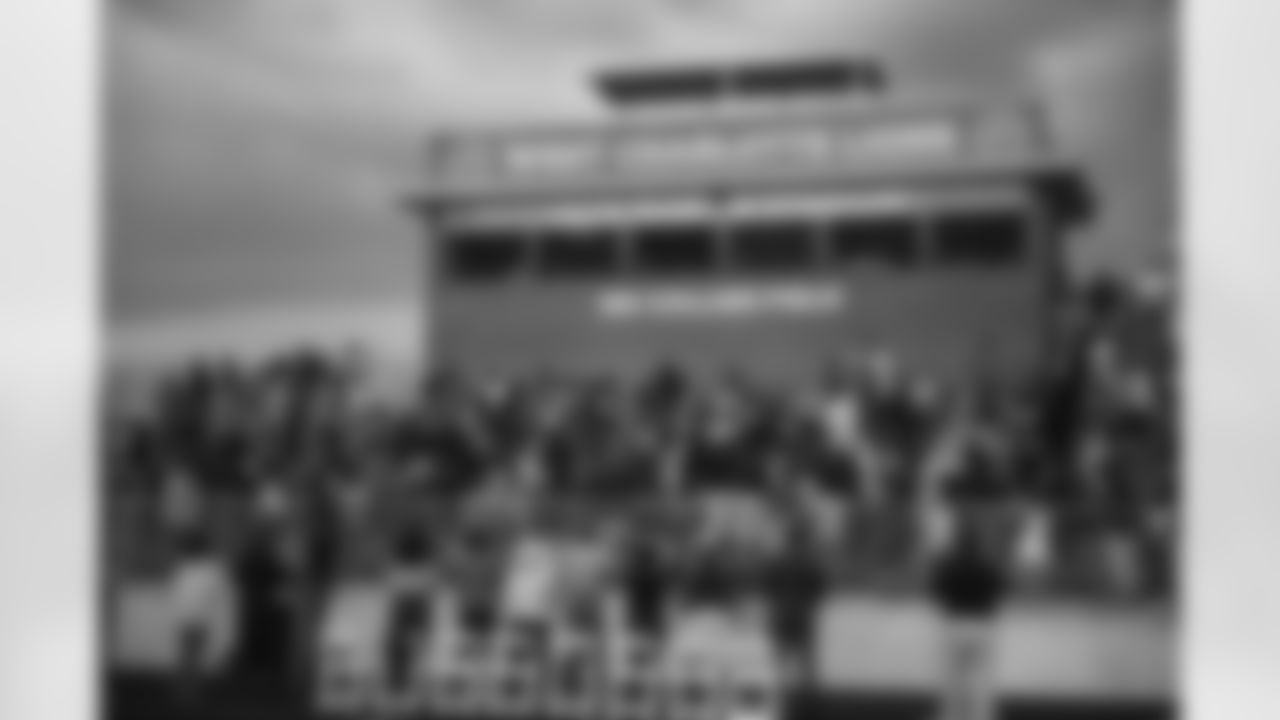 Fans watch the unveiling and dedication of Mo Collins Field.