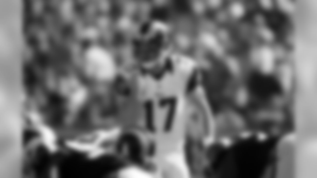 Los Angeles Rams quarterback Case Keenum yells to his team during the first half of an NFL football game against the Carolina Panthers, Sunday, Nov. 6, 2016, in Los Angeles. (AP Photo/Ryan Kang)