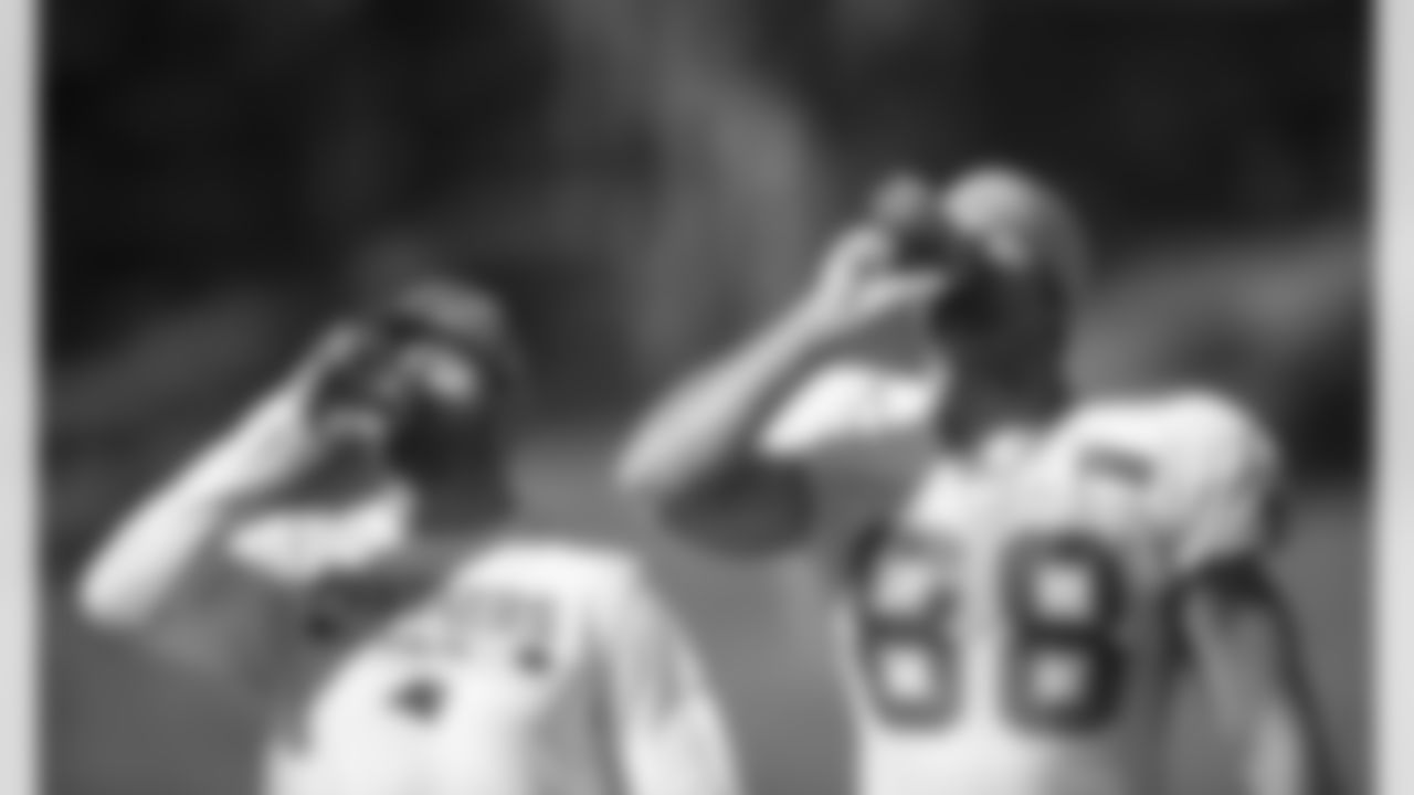 Greg Olsen and athletic performance analyst Bret Nenaber