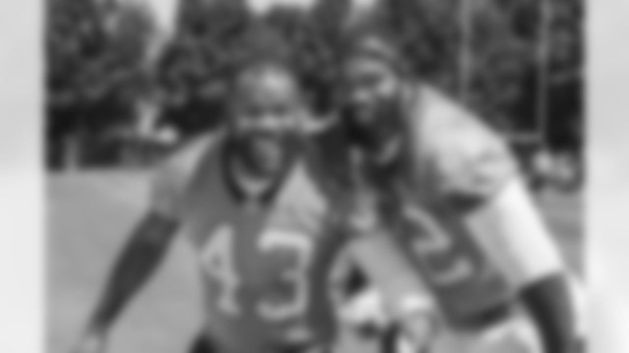 RB Fozzy Whittaker and TE Marcus Lucas