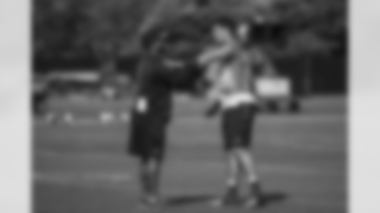 Asst. Defenasive Line Coach Sam Mills, III and TE Braxton Deaver