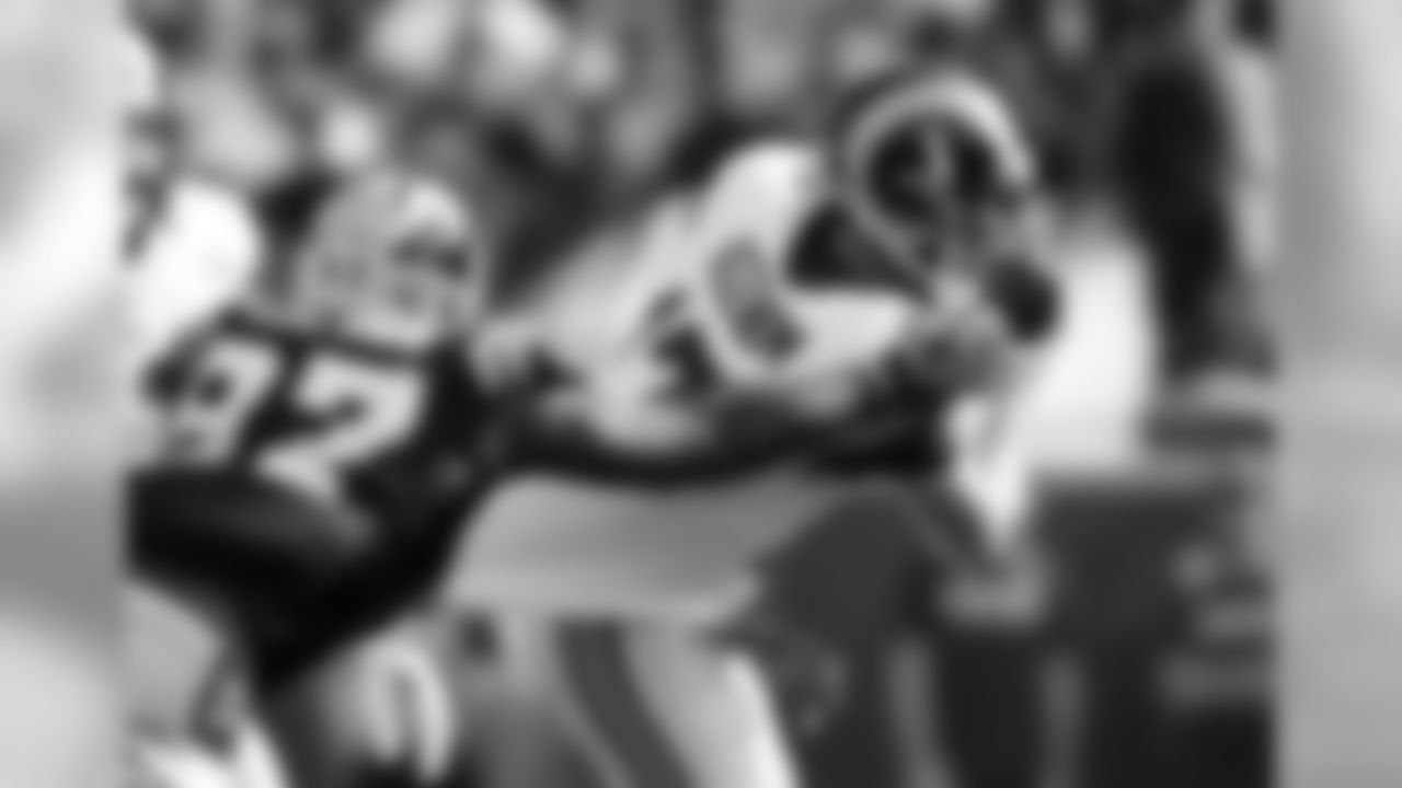 Los Angeles Rams quarterback Case Keenum, right, is sacked by Carolina Panthers defensive end Mario Addison during the first half of an NFL football game, Sunday, Nov. 6, 2016, in Los Angeles. (AP Photo/Ryan Kang)