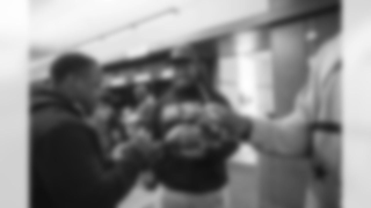 FB Mike Tolbert and DE Rakim Cox