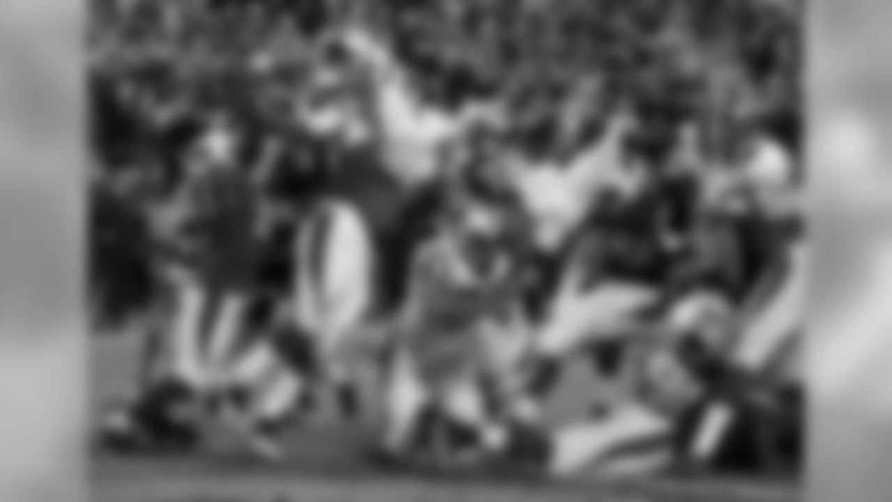 Carolina Panthers' Cam Newton dives into the end zone for a touchdown during the first half the NFL football NFC Championship game against the Arizona Cardinals, Sunday, Jan. 24, 2016, in Charlotte, N.C. (AP Photo/Chuck Burton)