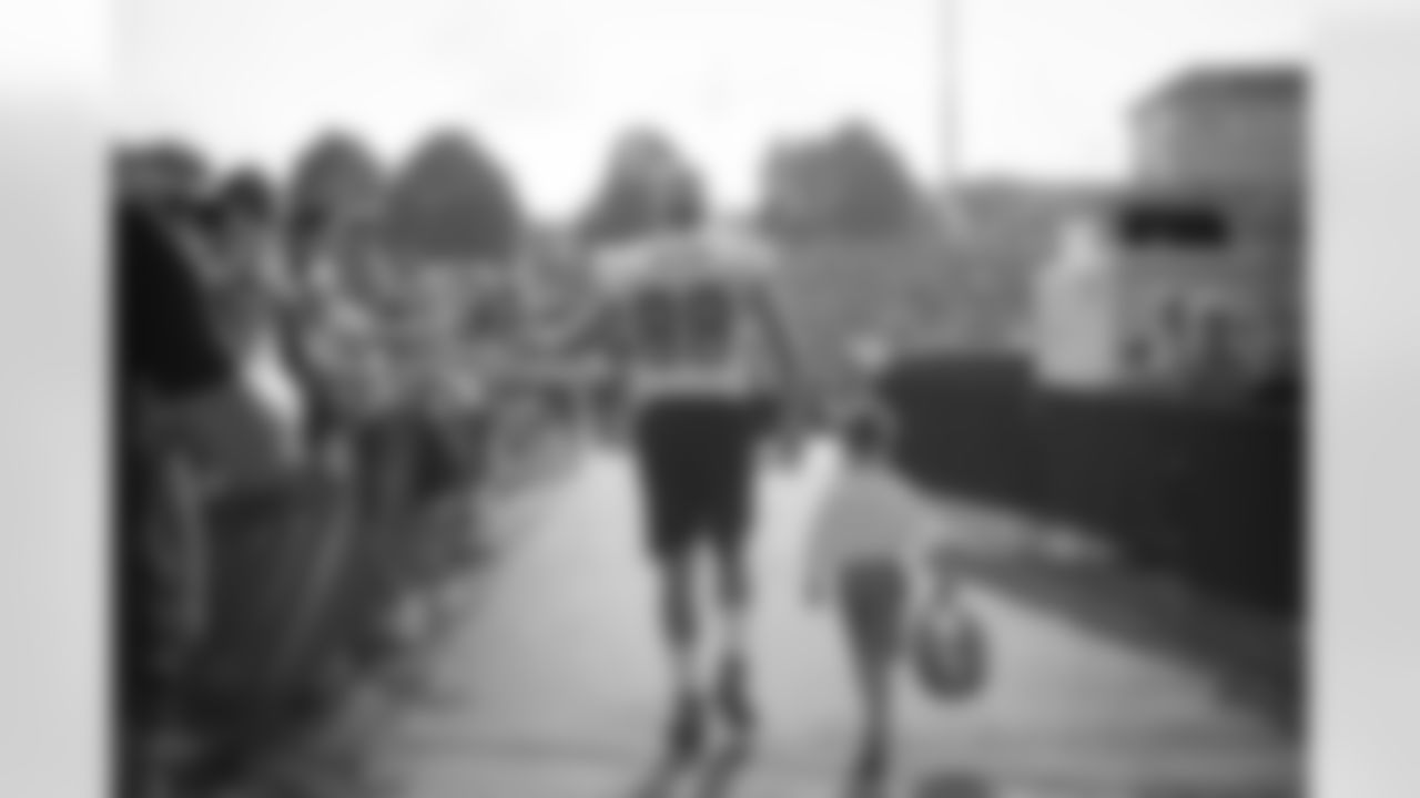 Training camp helmet walk