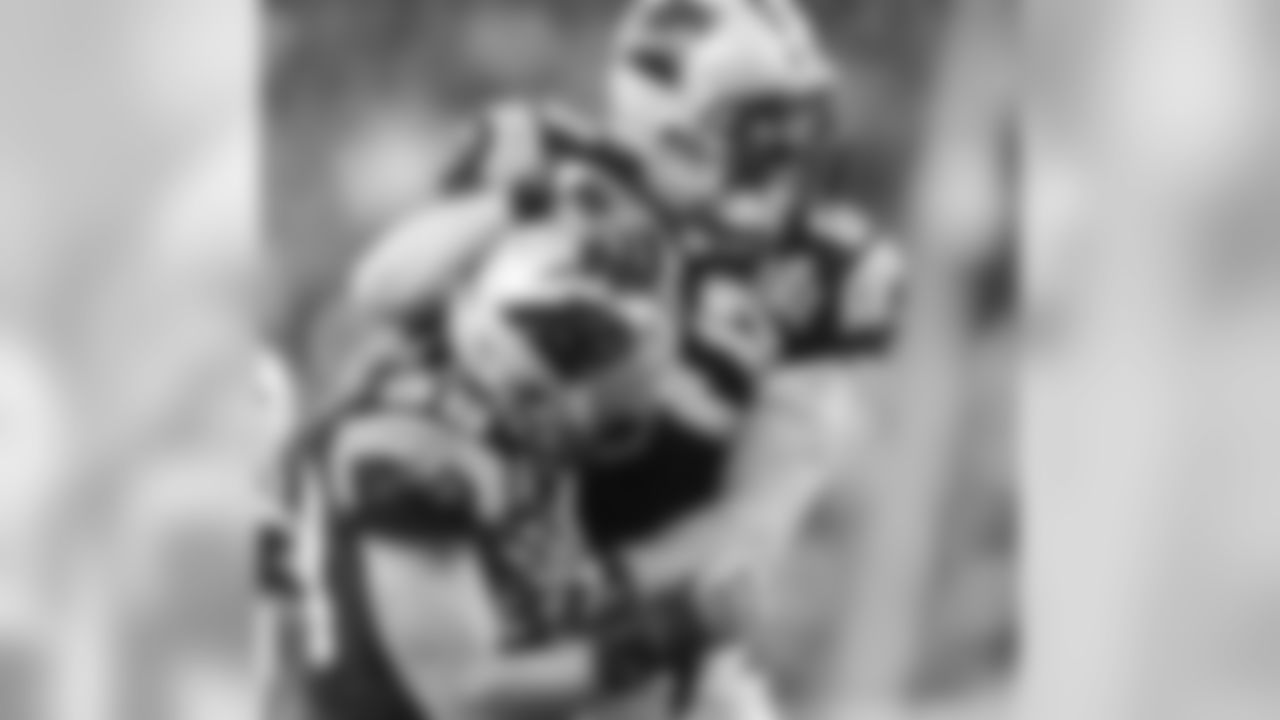 LB Luke Kuechly and DE Jared Allen
