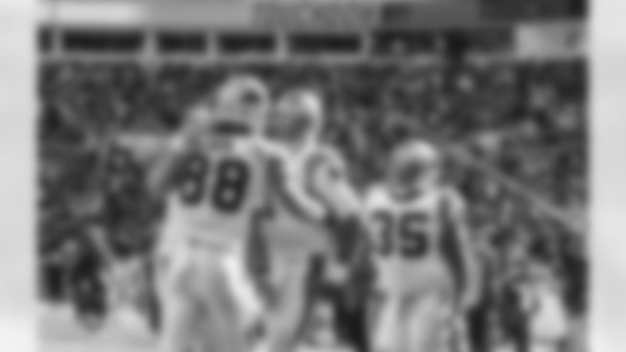 TE Greg Olsen, QB Cam Newton and FB Mike Tolbert