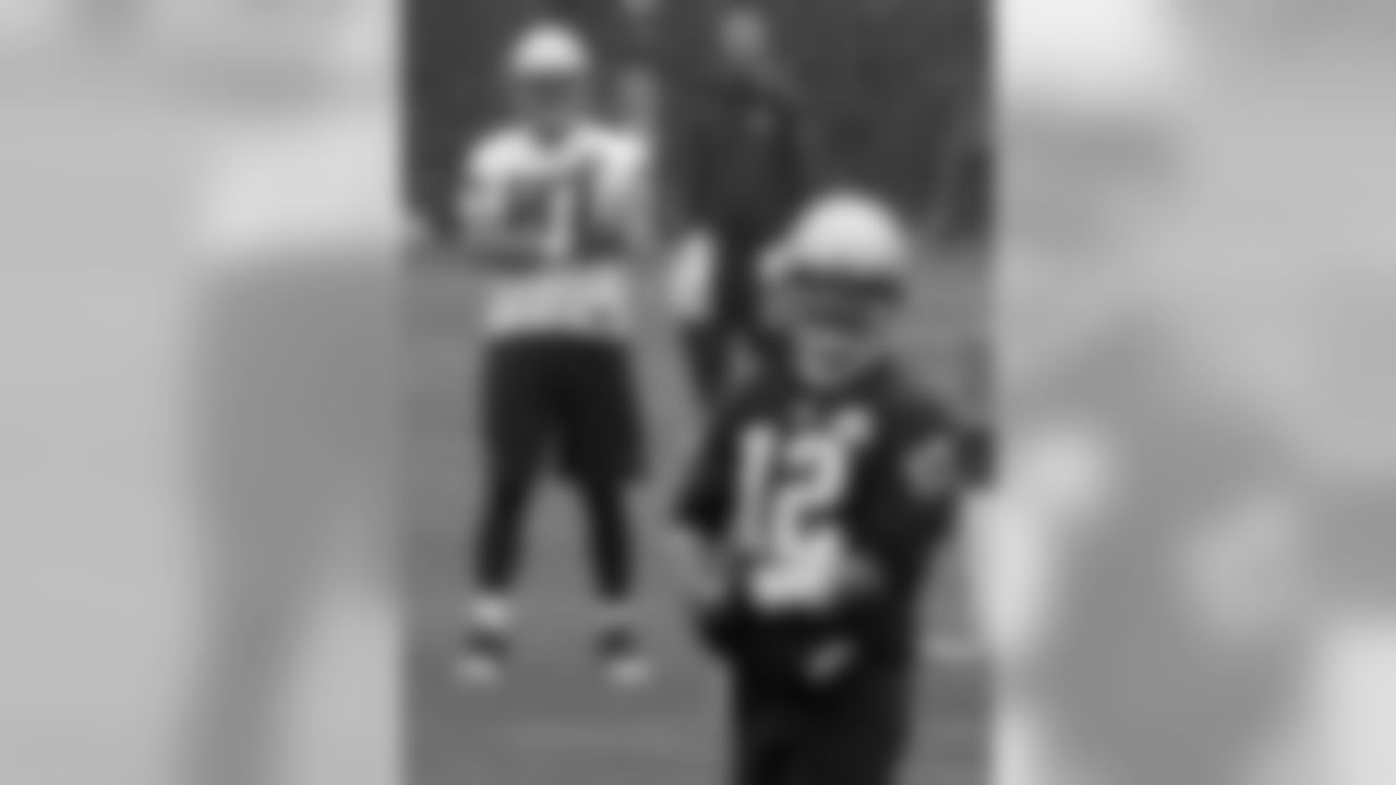 New England Patriots tight end Rob Gronkowski (87) watches quarterback Tom Brady (12) during an NFL football organized team activities practice Thursday, May 25, 2017, in Foxborough, Mass. (AP Photo/Bill Sikes)