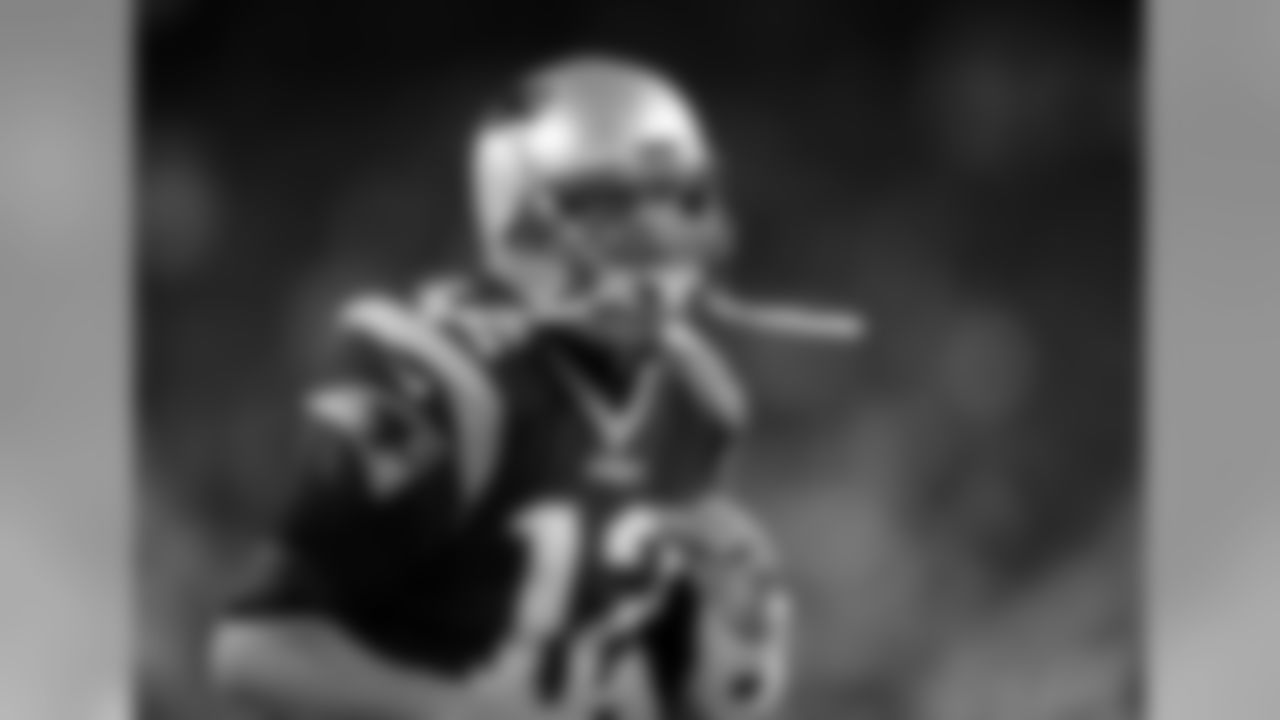New England Patriots quarterback Tom Brady shouts as he takes the field to warm up before an NFL football game against the Seattle Seahawks, Sunday, Nov. 13, 2016, in Foxborough, Mass. (AP Photo/Charles Krupa)