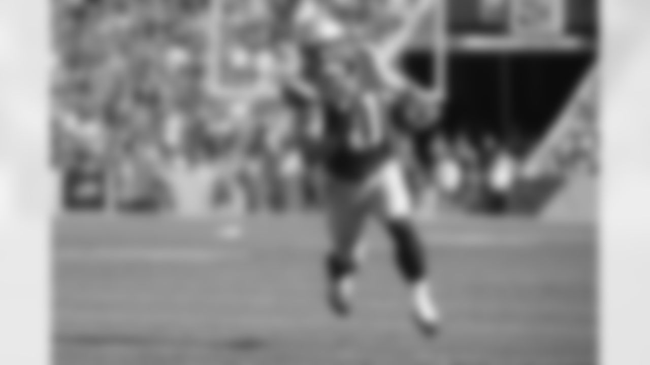 New England Patriots wide receiver Julian Edelman (11) runs for a touchdown during the second half of an NFL football game against the Buffalo Bills Sunday, Sept. 20, 2015, in Orchard Park, N.Y. (AP Photo/Gary Wiepert)