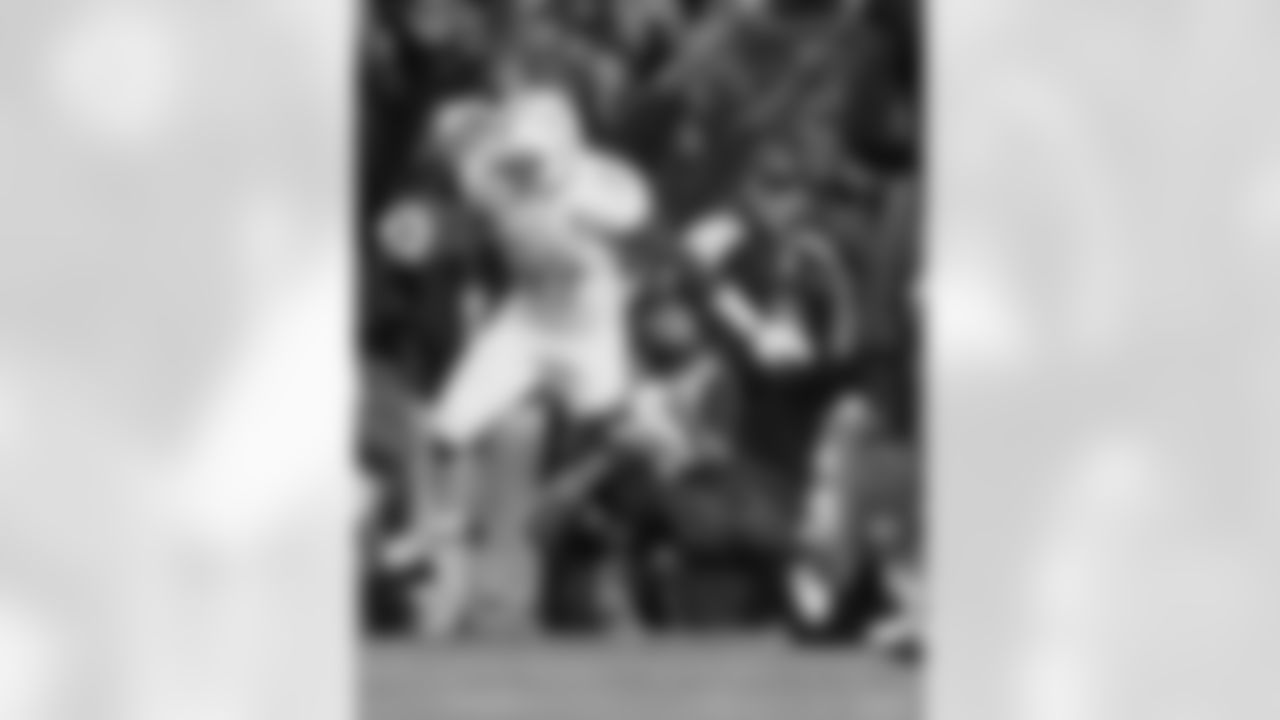 Tennessee's Justin Coleman returns an interception whlie pressured by South Carolina's Brandon Wilds during the first half of an NCAA college football game in Columbia, S.C.,  Saturday, Nov. 1, 2014. Tennessee won 45-42. (AP Photo/Richard Shiro)