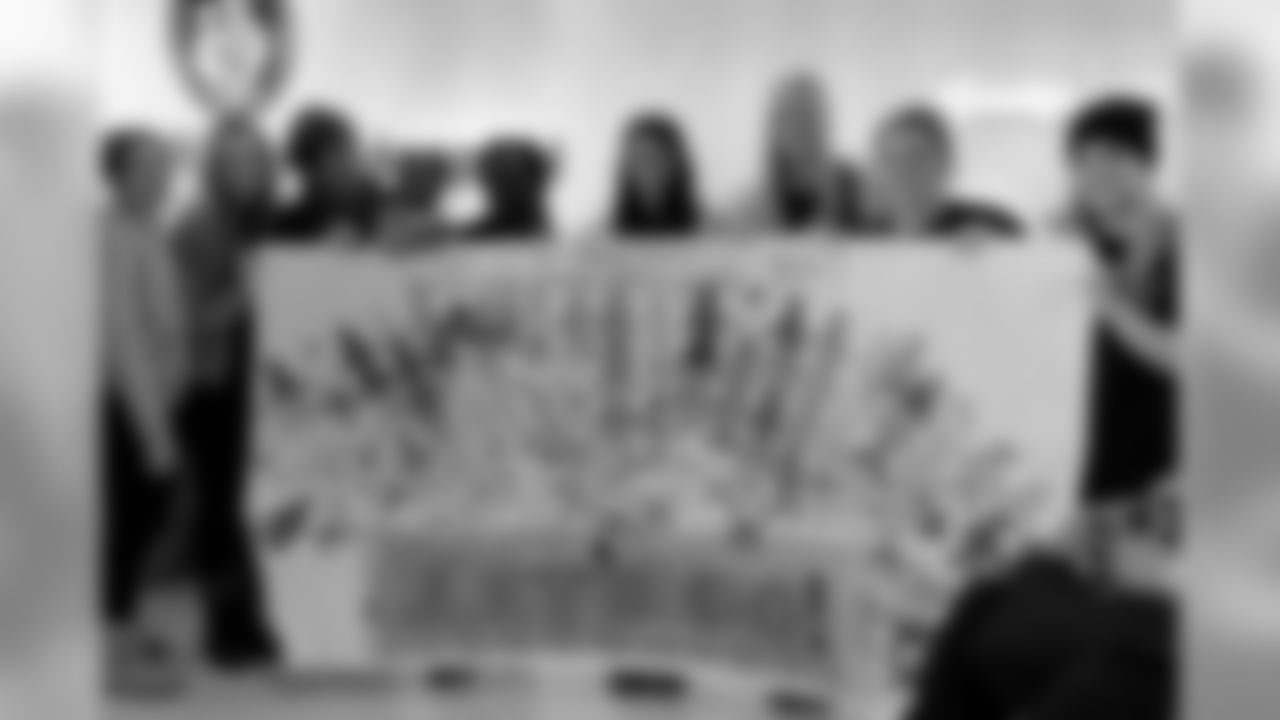 BOSTON, MA - JANUARY 7: New England Patriots Women's Association create a banner with the help of patients at Boston Children's Hospital January 7, 2016 in Boston, Massachusetts. (Photo by Darren McCollester/Getty Images for Boston Children's Hospital)