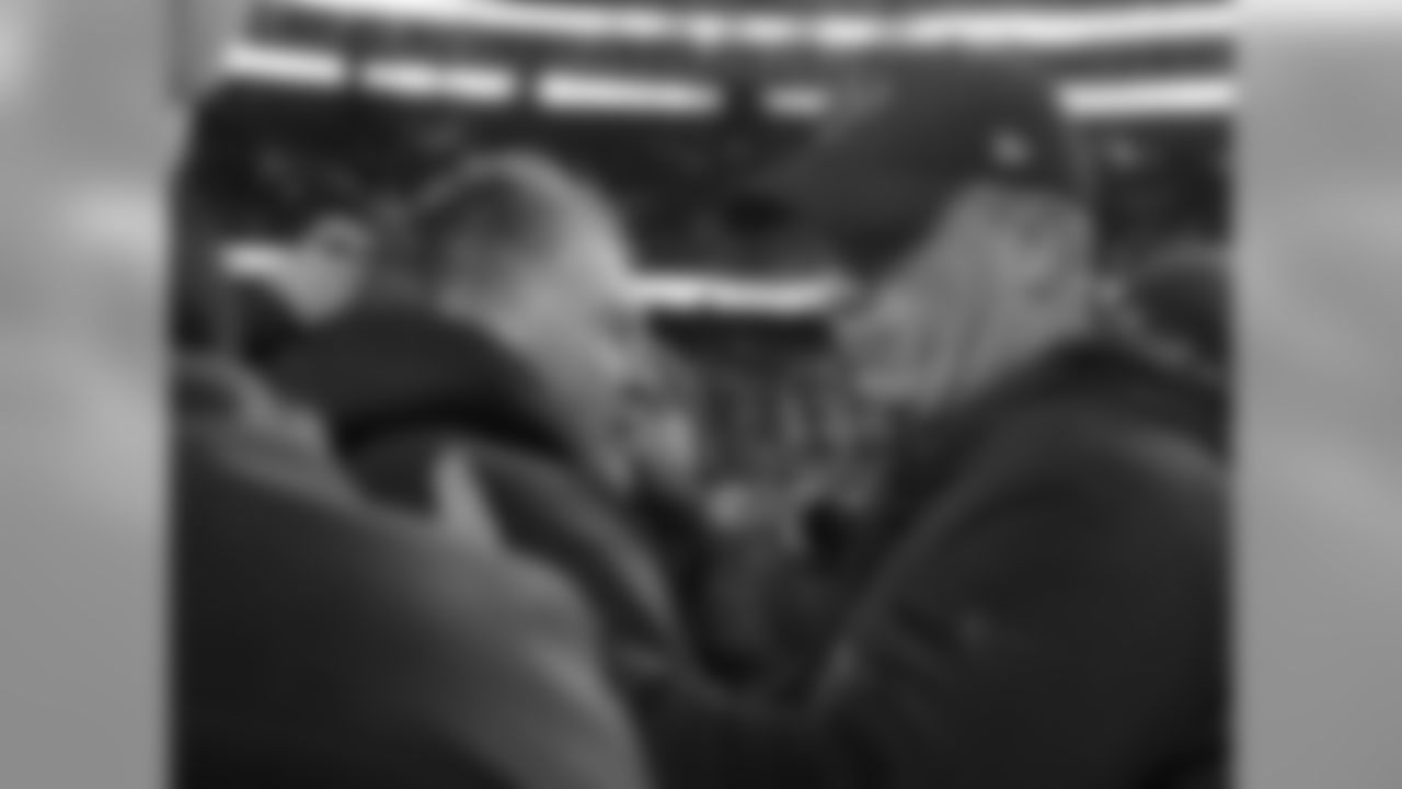 New England Patriots head coach Bill Belichick, left, and Houston Texans head coach Bill O'Brien speak at midfield after an NFL divisional playoff football game, Saturday, Jan. 14, 2017, in Foxborough, Mass. (AP Photo/Elise Amendola)