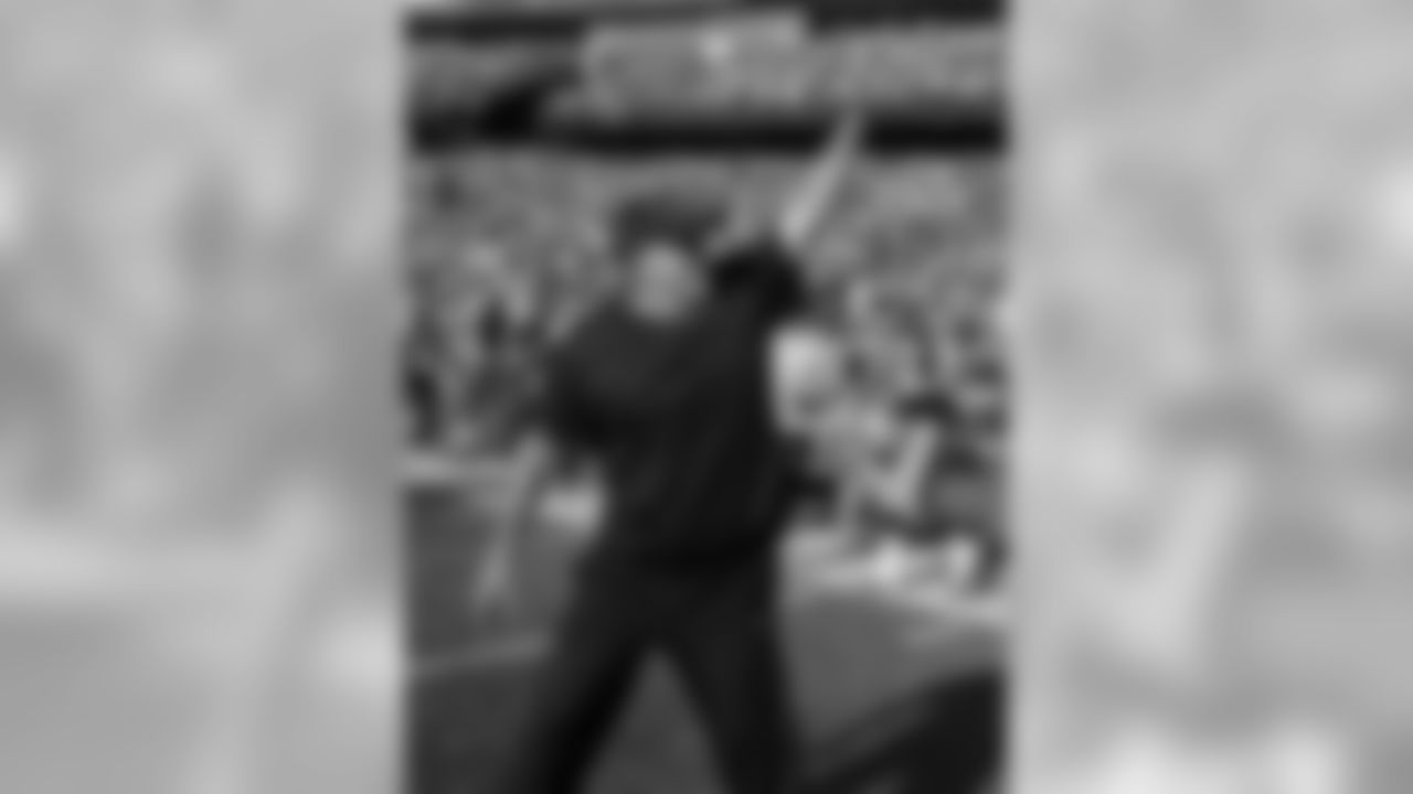 New England Patriots head coach Bill Belichick waves as he walks onto the field after an NFL football game against the Houston Texans, Sunday, Sept. 24, 2017, in Foxborough, Mass. (AP Photo/Michael Dwyer)