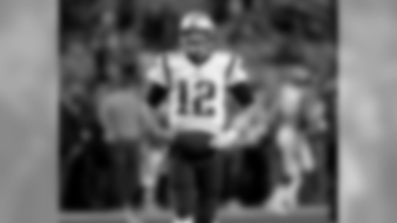 New England Patriots quarterback Tom Brady (12) warms up prior to an NFL football game against the Denver Broncos, Sunday, Nov. 12, 2017, in Denver. (AP Photo/David Zalubowski)