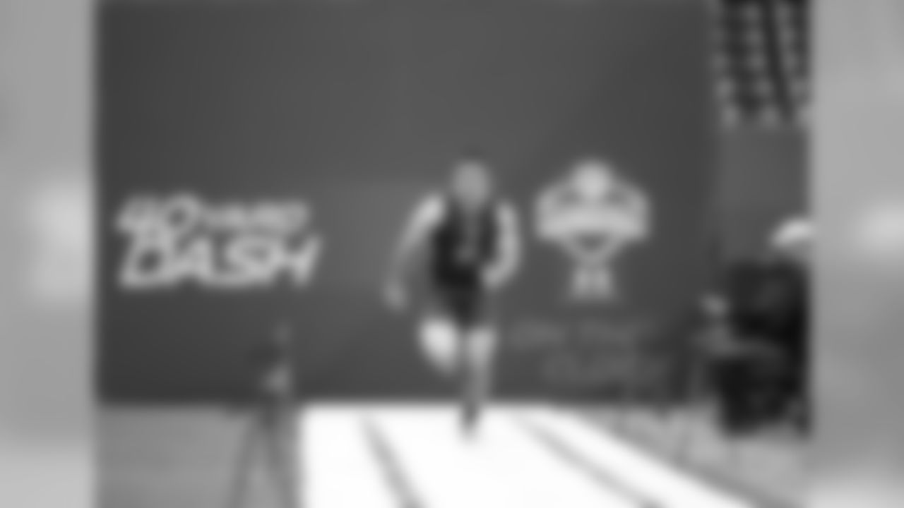 Navy long snapper Joe Cardona runs the 40 yard dash during the 2015 NFL Scouting Combine at Lucas Oil Stadium on Friday, February 20, 2015 in Indianapolis, IN. (AP Photo/Johnny Vy)
