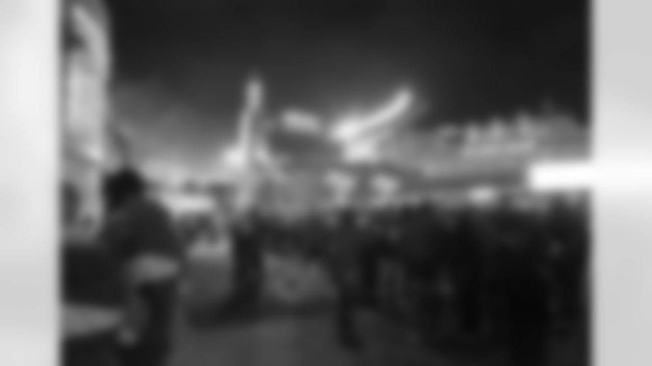 Fans arrive for an NFL football game between the New England Patriots and the Buffalo Bills, Monday, Nov. 23, 2015, in Foxborough, Mass. (AP Photo/Steven Senne)