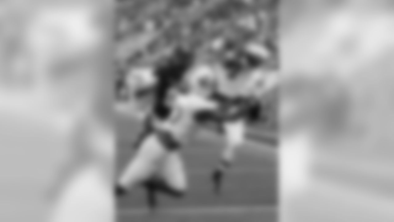 Marshall defensive back Darryl Roberts (7) tries to intercept a pass intended for Florida International wide receiver Thomas Owens (81) during the first half of an NCAA college football game, Saturday, Oct. 18, 2014, in Miami. (AP Photo/Alan Diaz)