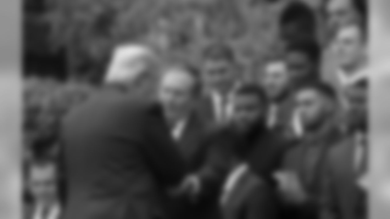 President Donald Trump shakes hands with New England Patriots head coach Bill Belichick during a ceremony on the South Lawn of the White House in Washington, Wednesday, April 19, 2017, where the president honored the Super Bowl Champion New England Patriots for their Super Bowl LI victory. (AP Photo/Susan Walsh)