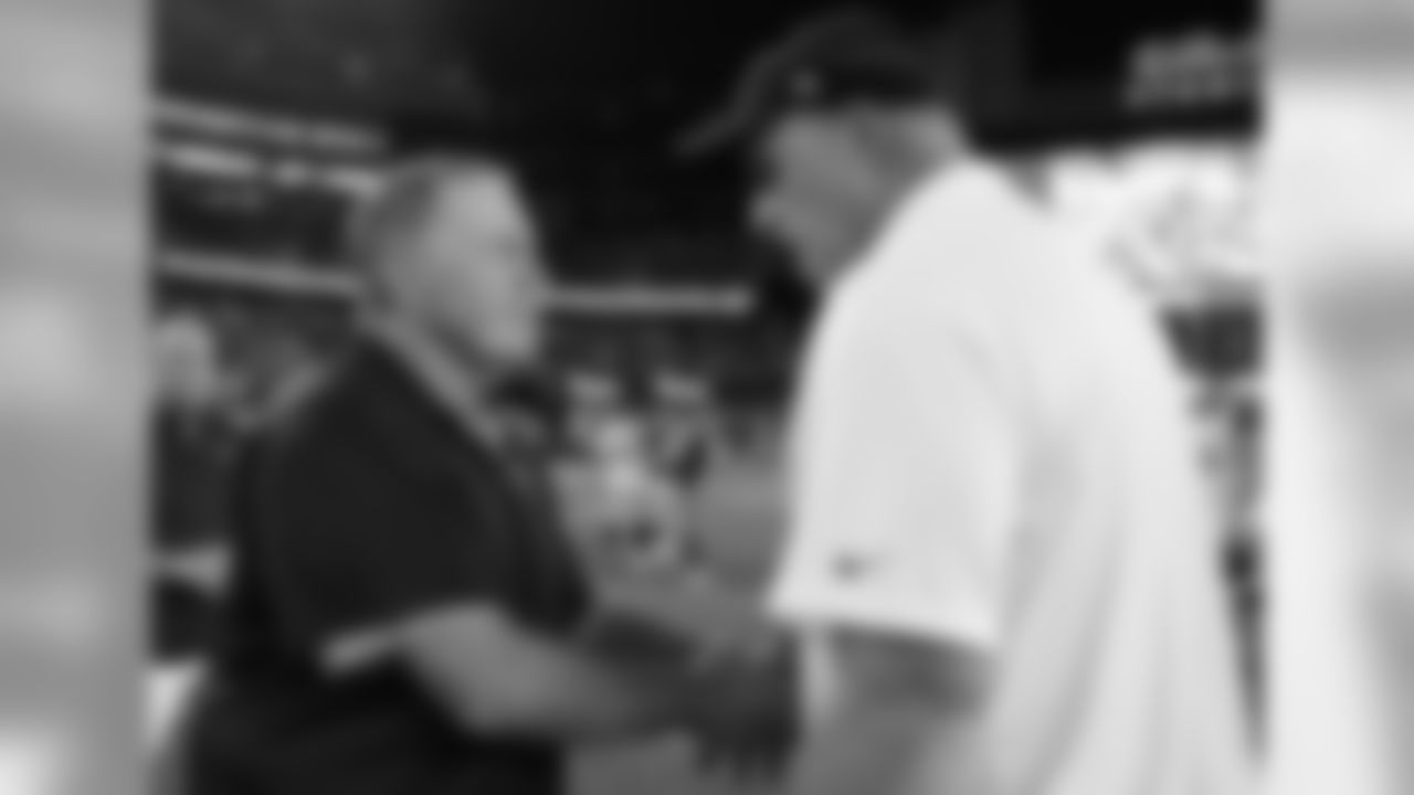 New England Patriots head coach Bill Belichick, left, and Jacksonville Jaguars head coach Doug Marrone speak at midfield after an NFL preseason football game, Thursday, Aug. 10, 2017, in Foxborough, Mass. (AP Photo/Mary Schwalm)