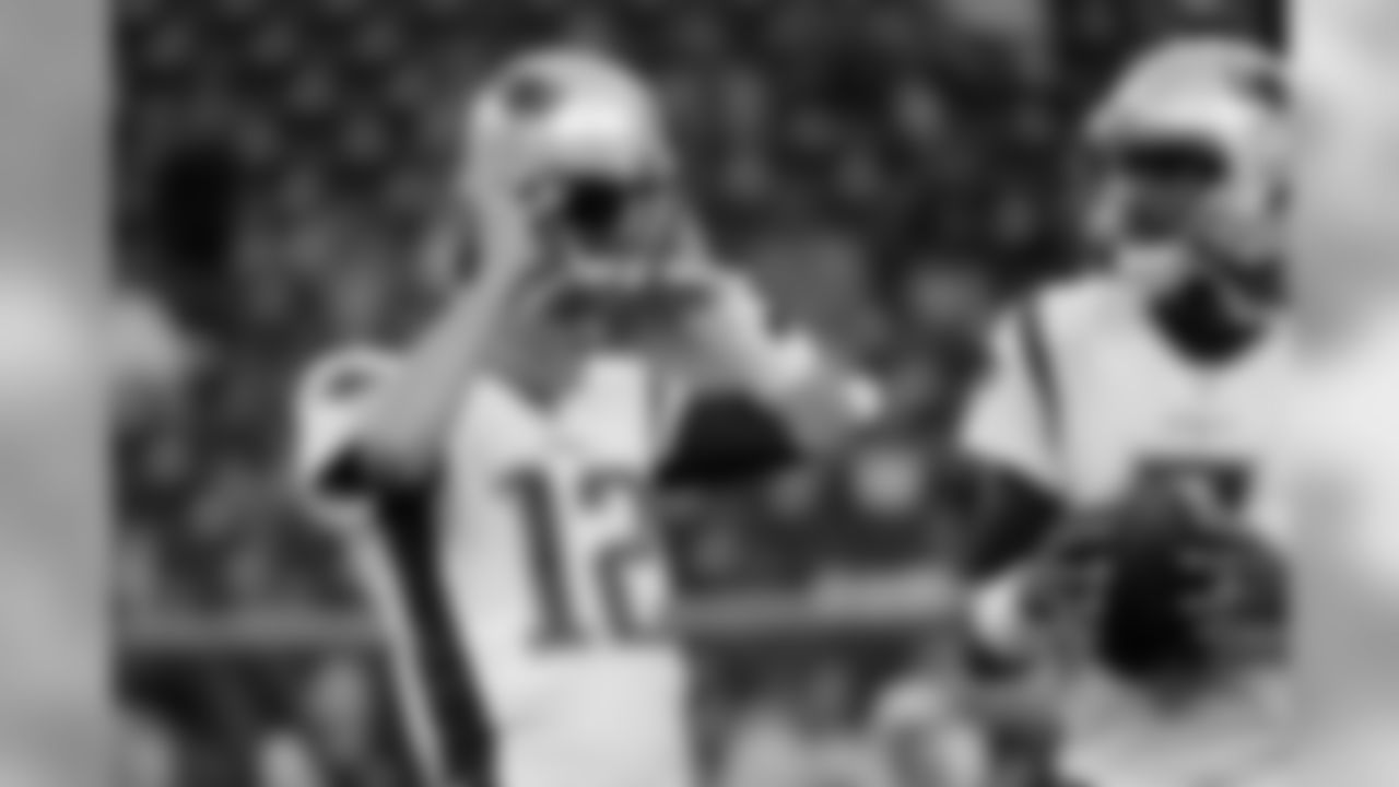 New England Patriots quarterback Tom Brady (12) and quarterback Jacoby Brissett (7) warm up before an NFL football preseason game against the Houston Texans Saturday, Aug. 19, 2017, in Houston. (AP Photo/David J. Phillip)