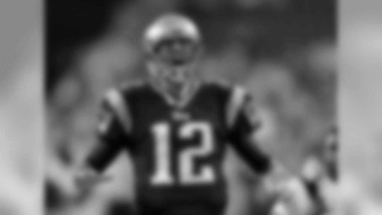 New England Patriots quarterback Tom Brady shouts as he takes the field before an NFL football game against the New York Jets Thursday, Sept. 12, 2013, in Foxborough, Mass. (AP Photo/Charles Krupa)