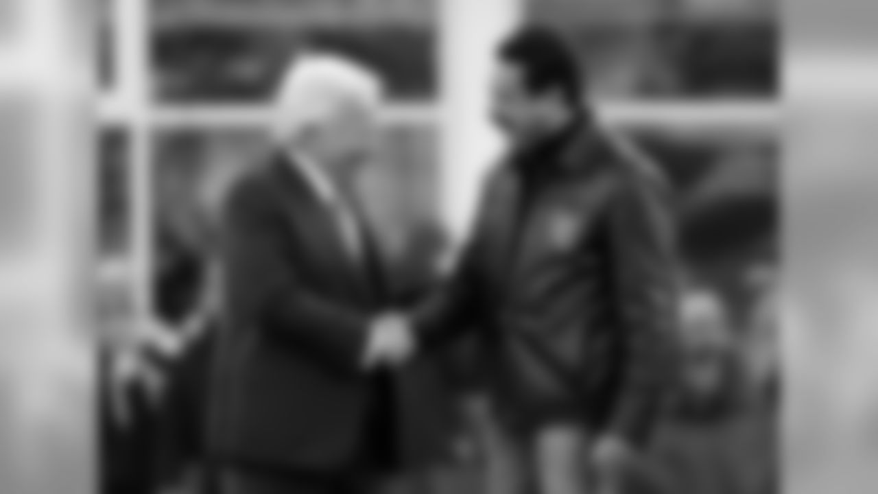 New England Patriots owner Robert Kraft, left, shakes hands with Jacksonville Jaguars owner Shahid Khan before the AFC championship NFL football game, Sunday, Jan. 21, 2018, in Foxborough, Mass. (AP Photo/Steven Senne)