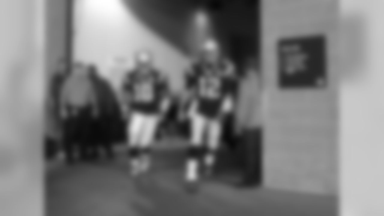 New England Patriots quarterbacks Jimmy Garoppolo, left, and Tom Brady take the field for warms up before an NFL football game against the Pittsburgh Steelers Thursday, Sept. 10, 2015, in Foxborough, Mass. (AP Photo/Winslow Townson)