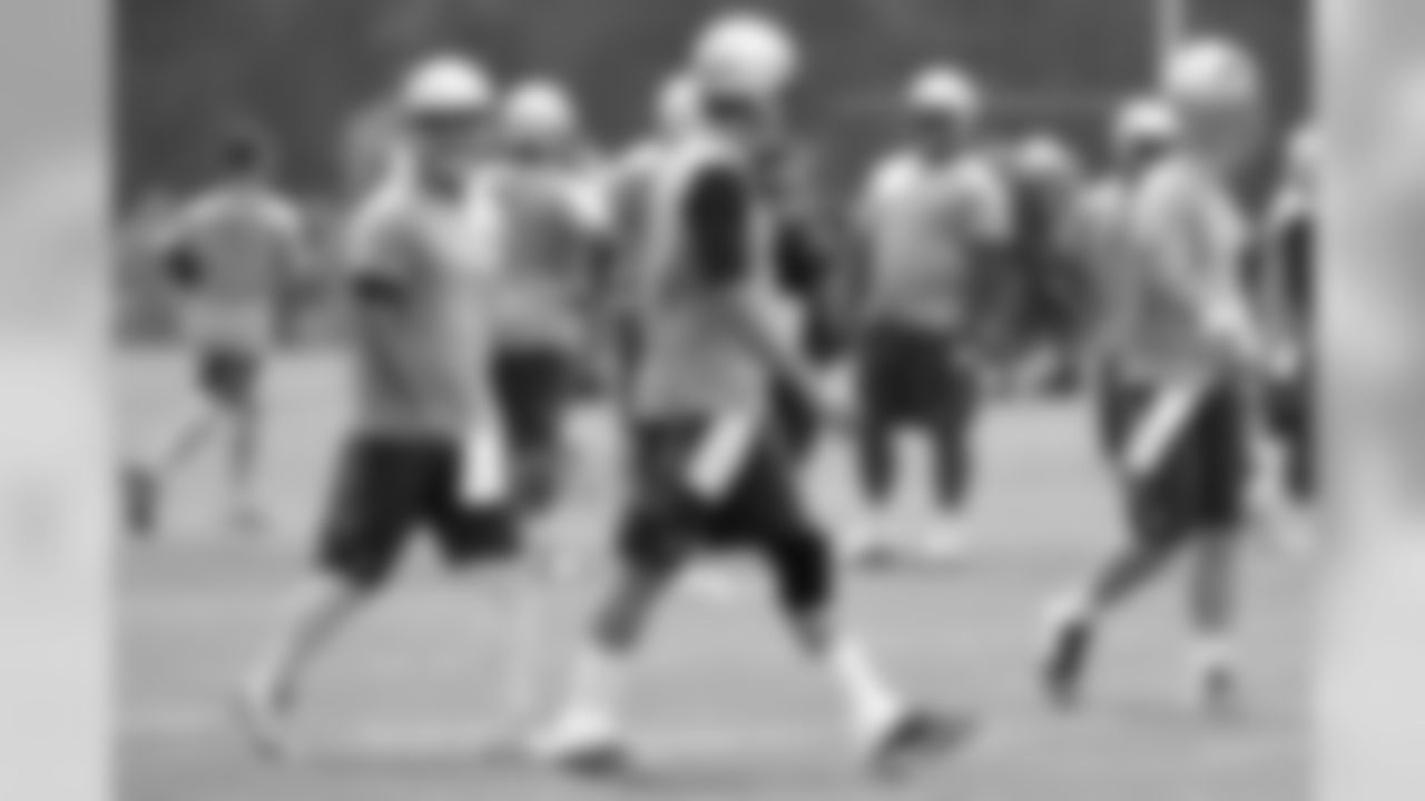 June 11, 2015 - Foxborough, Massachusetts, U.S. - New England Patriots quarterback Jimmy Garoppolo (10) (left) and quarterback Tom Brady (12) (right) take part in the organized team activities held on the practice fields at Gillette Stadium in Foxborough Massachusetts. Eric Canha/CSM (Cal Sport Media via AP Images)