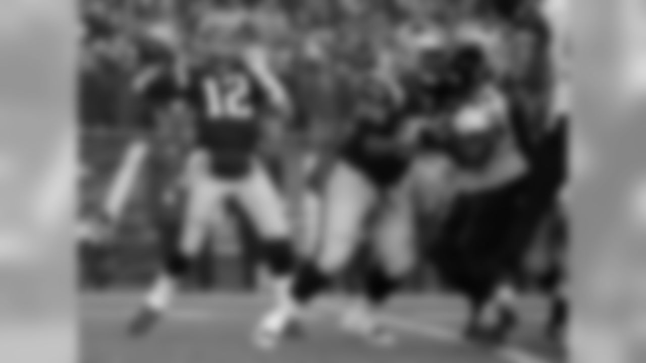 New England Patriots quarterback Tom Brady (12) passes against the Baltimore Ravens during the first half of an NFL football game, Monday, Dec. 12, 2016, in Foxborough, Mass. (AP Photo/Steven Senne)
