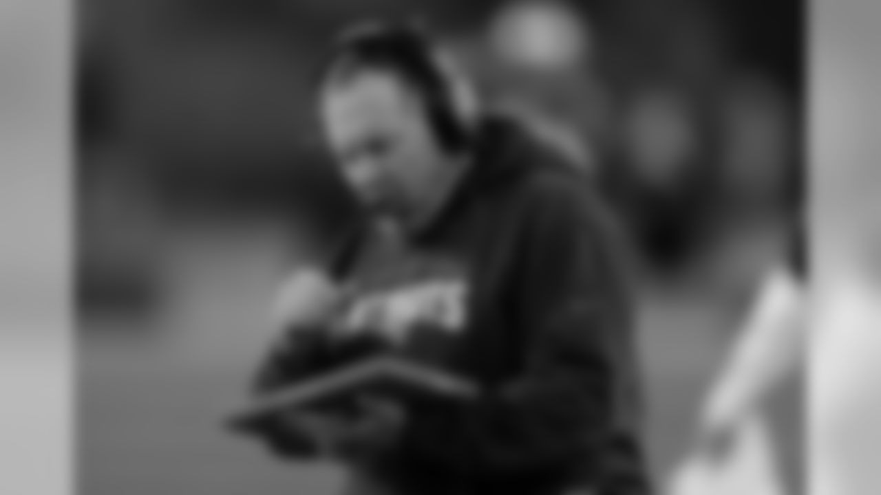 New England Patriots head coach Bill Belichick studies a tablet device along the sideline during the first half of an NFL football game against the Philadelphia Eagles, Sunday, Dec. 6, 2015, in Foxborough, Mass. (AP Photo/Charles Krupa)