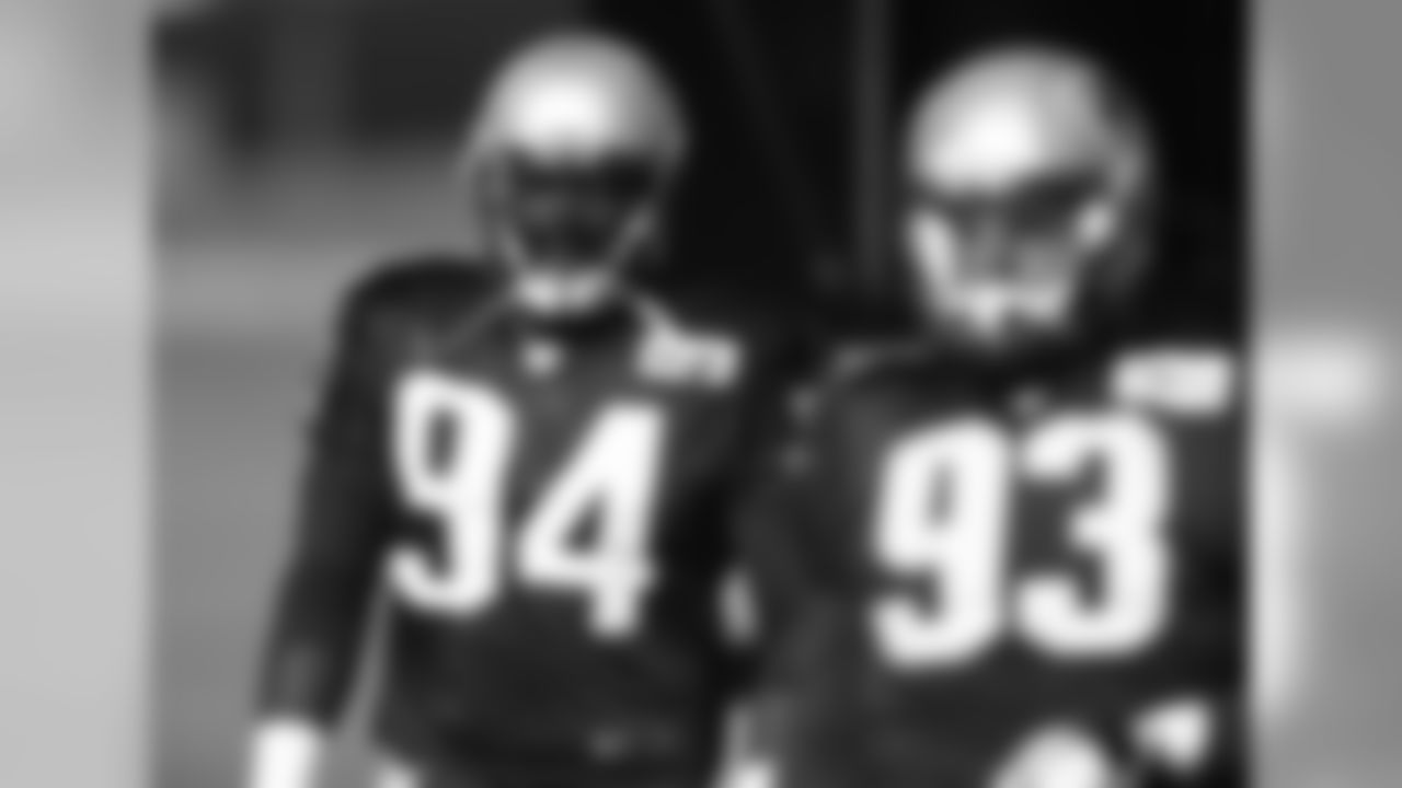 New England Patriots defensive tackle Ricky Jean Francois, back, takes part in drills before practicing with defensive end Lawrence Guy Wednesday, Nov. 15, 2017, on the campus of the Air Force Academy in Air Force Academy, Colo. The Patriots are practicing at Air Force, which is located at an elevation of 7,200 feet, to prepare to face the Oakland Raiders during an NFL football game Sunday in Mexico City, which sits at an elevation of almost 7,400 feet above sea level. (AP Photo/David Zalubowski)