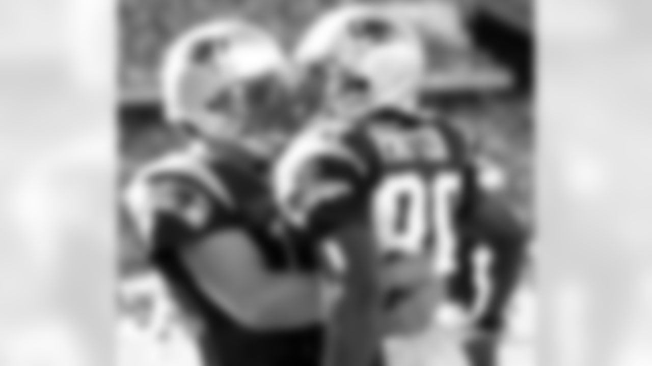 Chiefs RB Priest Holmes (30 carries, 180 yards) scored on a 1-yard TD run on the final play of regulation to cap a furious fourth-quarter comeback by Kansas City, which trailed by two touchdowns with 6:10 to go. But the Patriots rallied thanks to Adam Vinatieri's 35-yard field goal in overtime, giving New England a 41-38 win Sept. 22, 2002. Tom Brady threw for four TDs and 410 yards, marking his first career 400-yard passing game.