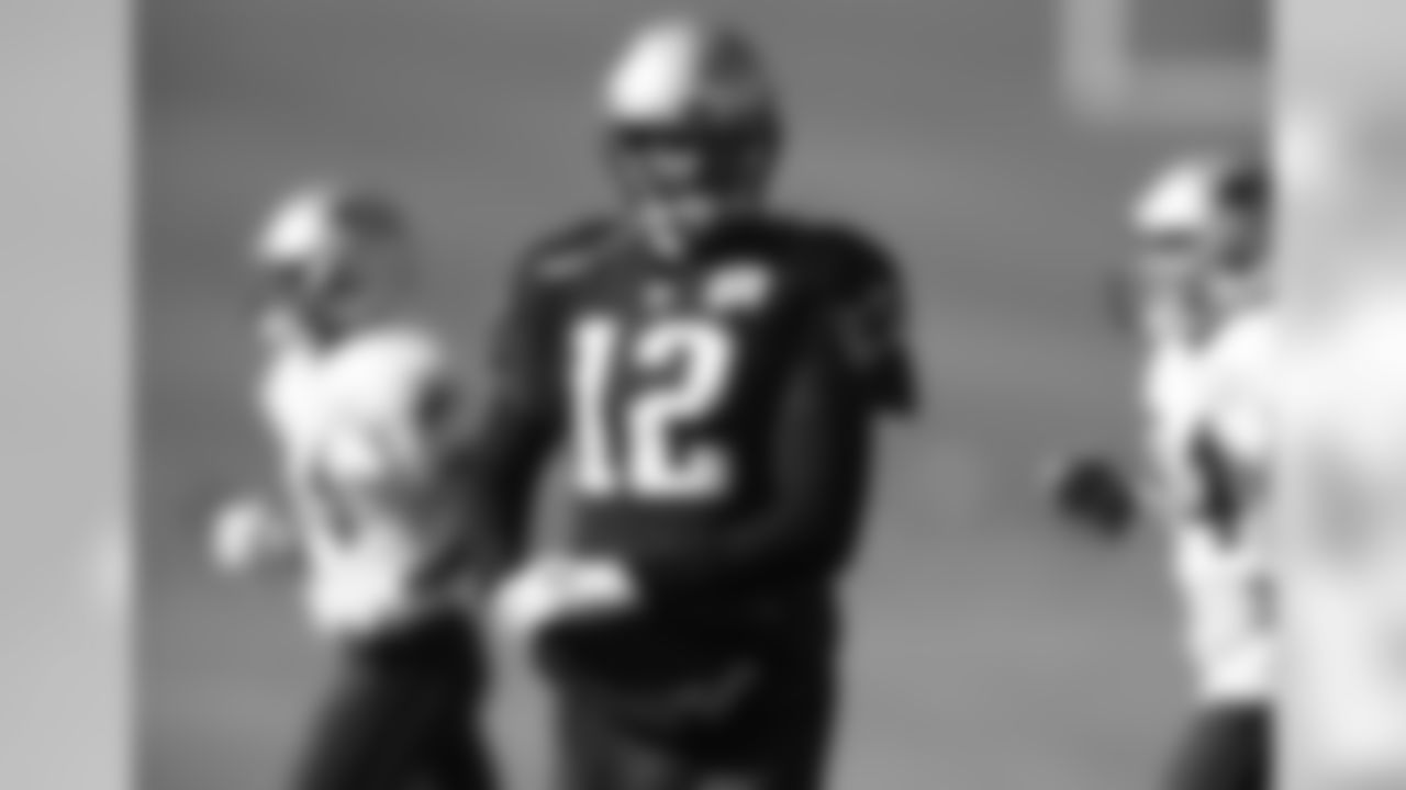 New England Patriots quarterback Tom Brady takes part in drills before practicing Wednesday, Nov. 15, 2017, on the campus of the Air Force Academy in Air Force Academy, Colo. The Patriots are practicing at Air Force, which is located at an elevation of 7,200 feet, to prepare to face the Oakland Raiders during an NFL football game Sunday in Mexico City, which sits at an elevation of almost 7,400 feet above sea level. (AP Photo/David Zalubowski)