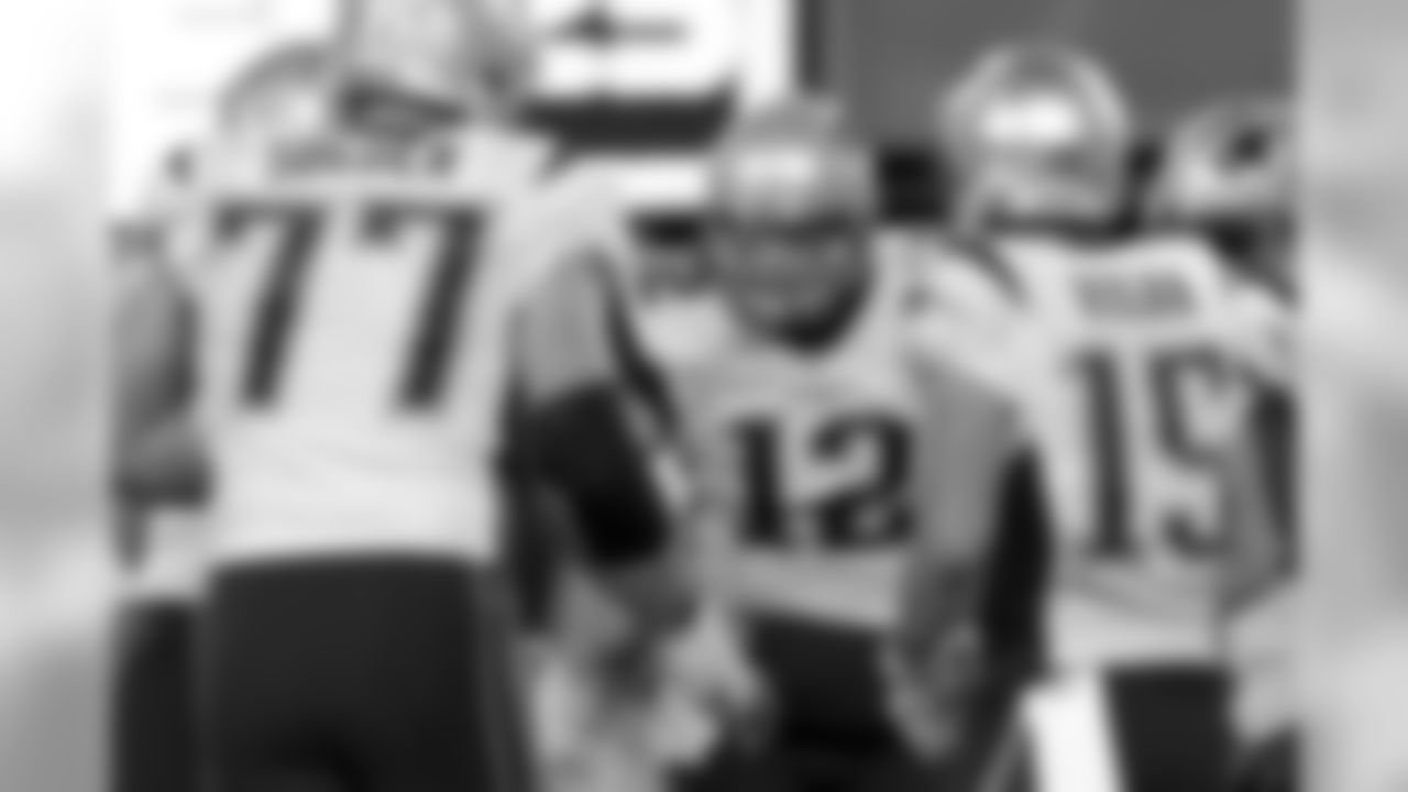 New England Patriots quarterback Tom Brady (12) huddles with teammates during the second quarter of an NFL football game against the New York Jets, Sunday, Nov. 27, 2016, in East Rutherford, N.J. (AP Photo/Bill Kostroun)