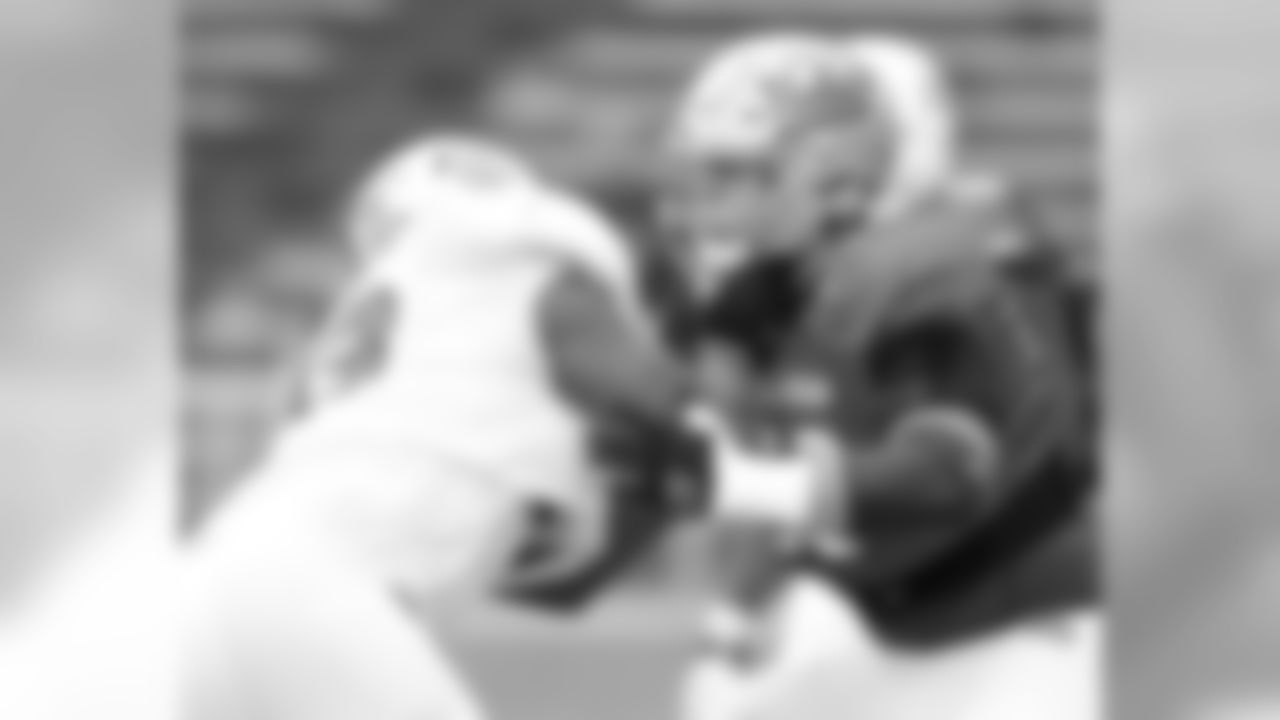 South squad offensive tackle Conor McDermott of UCLA (68) and South squad defensive end Keionta Davis of UT-Chattanooga (93) practices for Saturday's Senior Bowl college football game in Mobile, Ala., Thursday, Jan. 26, 2017. (AP Photo/Brynn Anderson)