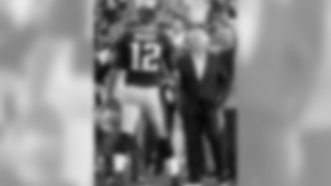 New England Patriots owner Robert Kraft, right, greets quarterback Tom Brady (12) before an NFL preseason football game against the New York Giants, Thursday, Aug. 31, 2017, in Foxborough, Mass. (AP Photo/Winslow Townson)