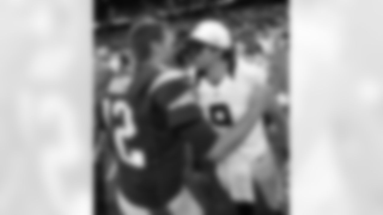 New England Patriots quarterback Tom Brady (12) greets New Orleans Saints quarterback Drew Brees (9) after an NFL preseason football game in New Orleans, Saturday, Aug. 22, 2015. The Patriots won 26-24. (AP Photo/Bill Feig)