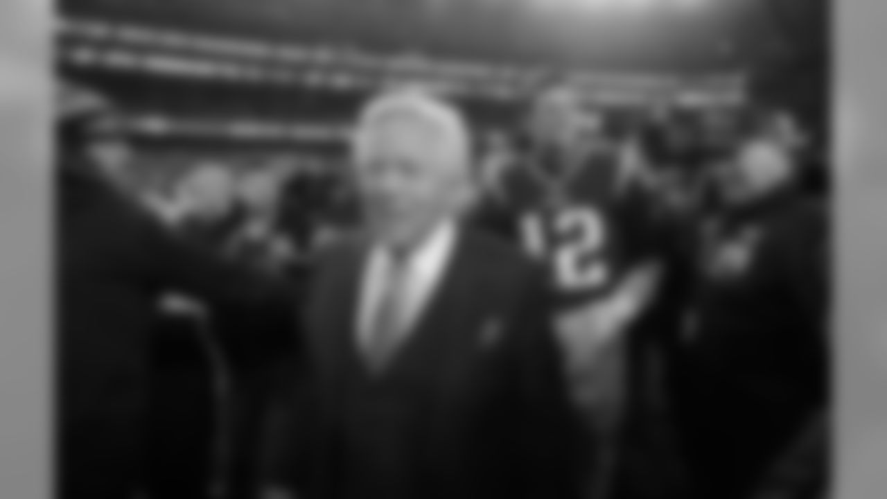 New England Patriots owner Robert Kraft and quarterback Tom Brady (12) leave the field after winning the AFC championship NFL football game against the Jacksonville Jaguars, Sunday, Jan. 21, 2018, in Foxborough, Mass. (AP Photo/Charles Krupa)