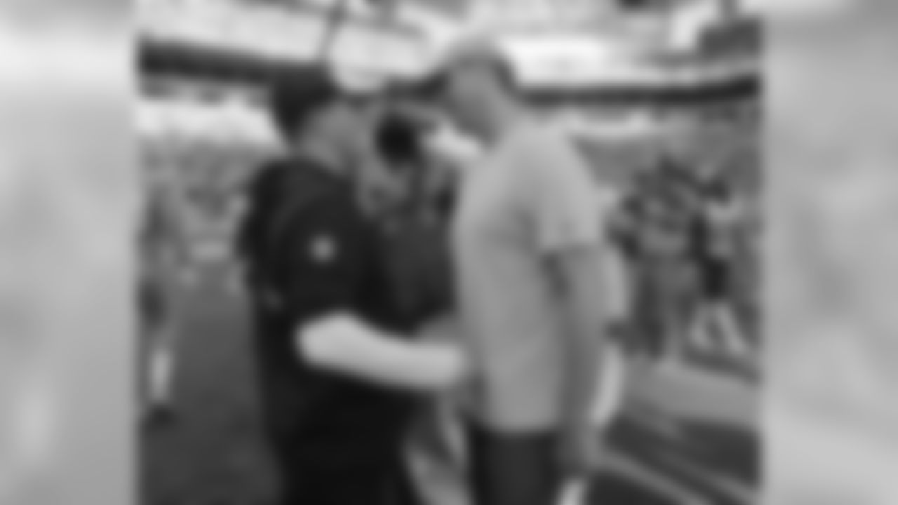 Miami Dolphins head coach Adam Gase is greeted on the field by New England Patriots offensive coordinator Josh McDaniels, after an NFL football game, Sunday, Jan. 1, 2017, in Miami Gardens, Fla. The Patriots defeated the Dolphins 35-14. (AP Photo/Lynne Sladky)