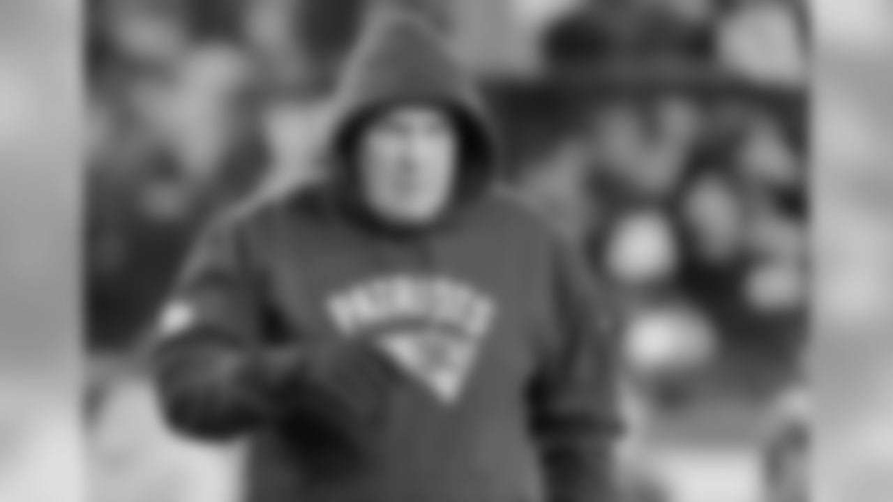 New England Patriots head coach Bill Belichick watches his team warm up before an NFL divisional playoff football game against the Houston Texans, Saturday, Jan. 14, 2017, in Foxborough, Mass. (AP Photo/Elise Amendola)