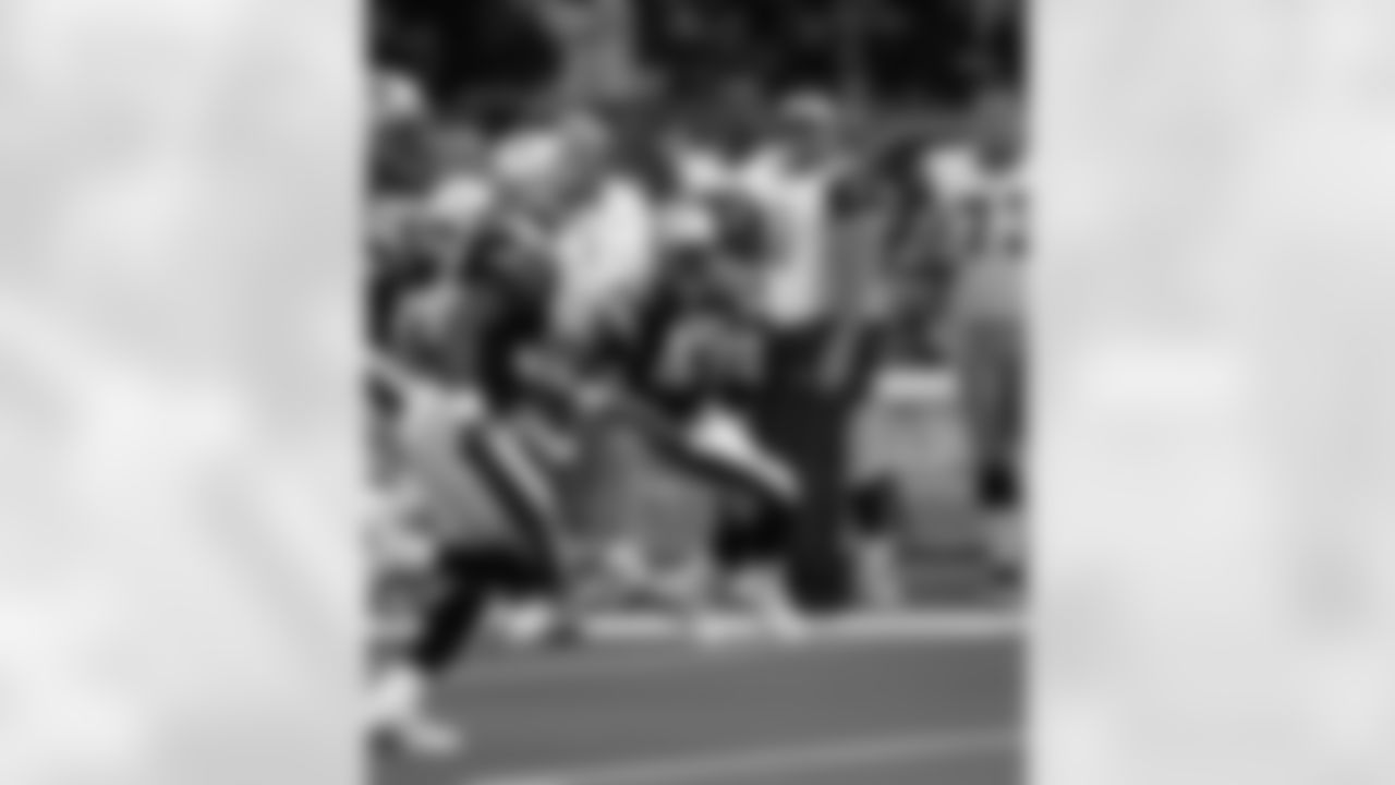 Otis Smith interception in third quarter to set up Vinatieri field goal and 17-3 lead (XXXVI vs Rams).