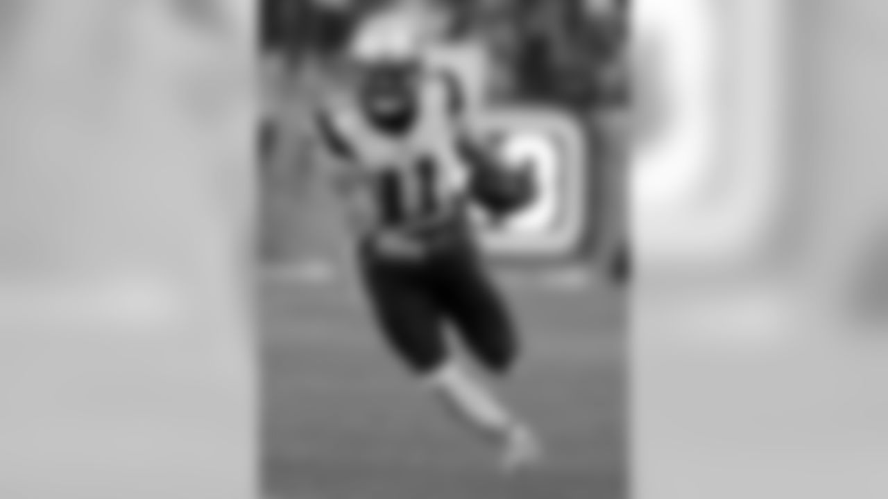 New England Patriots wide receiver Julian Edelman runs against the Denver Broncos during the first half of an NFL football game Sunday, Dec. 18, 2016, in Denver. (AP Photo/Jack Dempsey)
