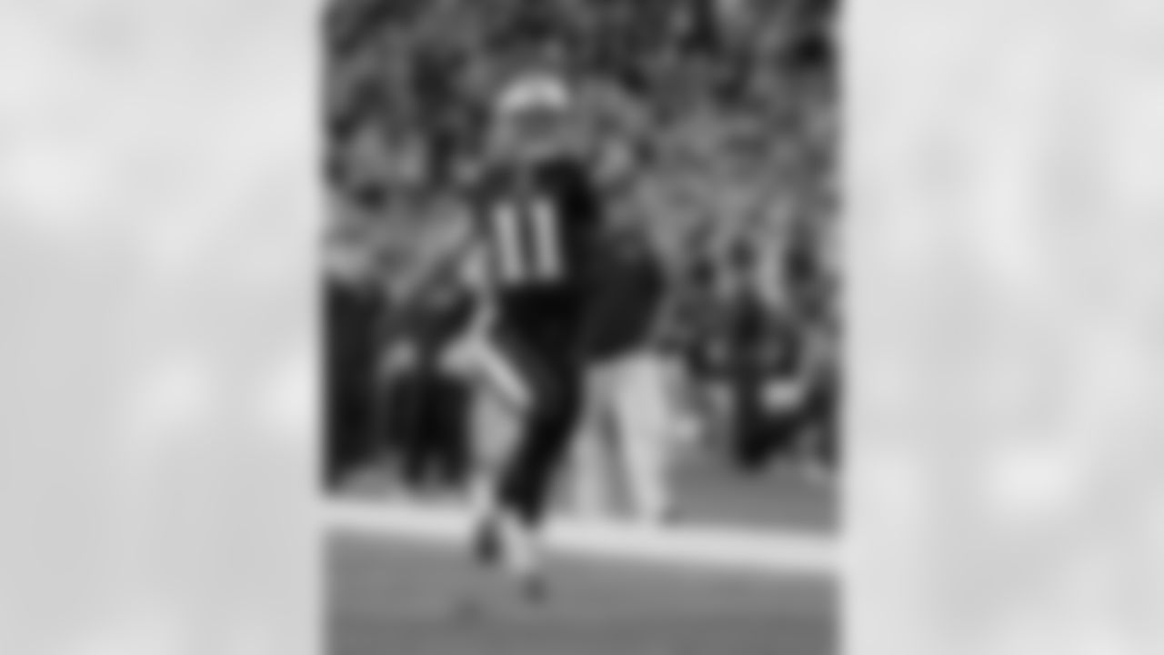 New England Patriots wide receiver Julian Edelman charges onto the field for an NFL football game against the Houston Texans Thursday, Sept. 22, 2016, in Foxborough, Mass. (AP Photo/Elise Amendola)